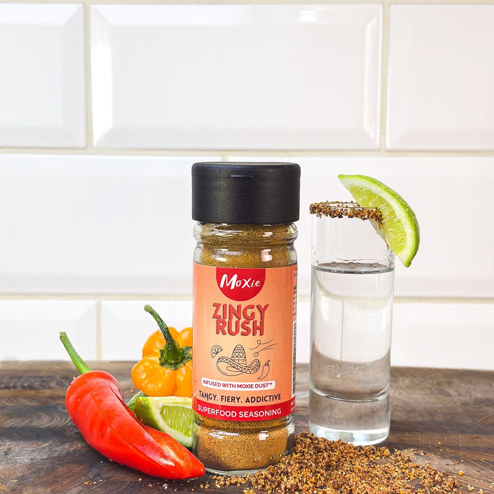 Moxie Zingy Rush Superfood Seasoning bottle with chillies and lime slice